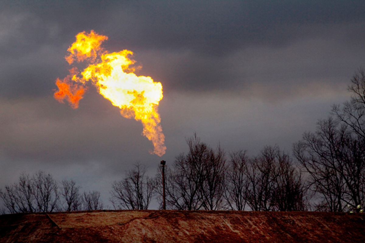 A gas flare burns at a fracking site in rural Bradford County, Pennsylvania January 9, 2012       (Reuters/Les Stone)