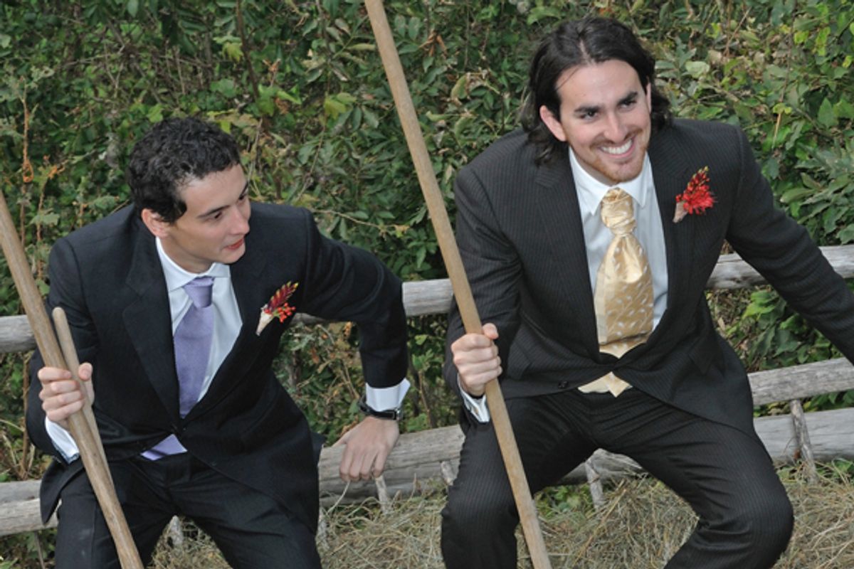 The groom (right) is driven by hay cart (which he recently filled using a wooden pitchfork) in victory up to the church, after having successfully conquered the feats of manliness.       (Iztok Grilc)
