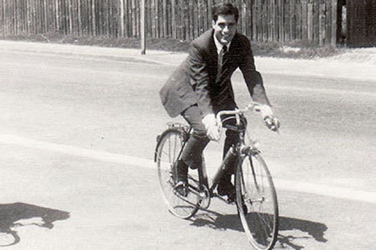 A young Romney rides a bicycle in France.   (André Salarnier)