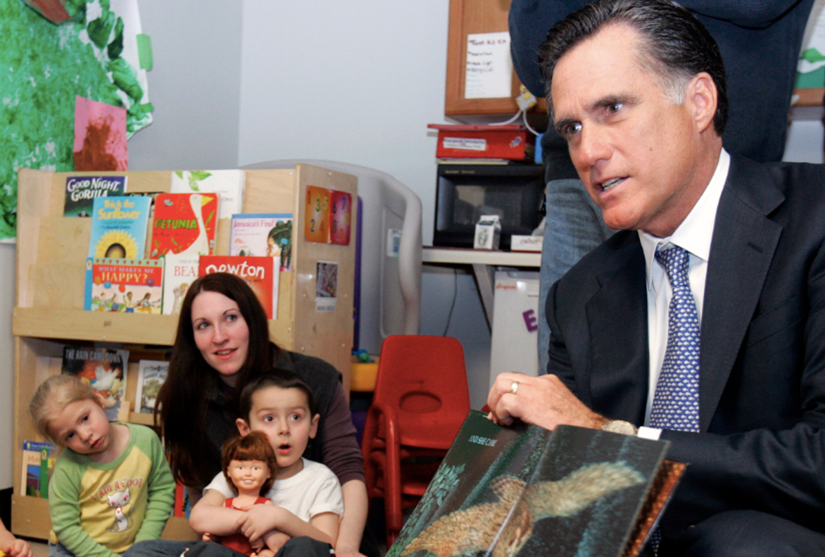 Republican presidential candidate and former Massachusetts Governor Mitt Romney reads a book to children in Manchester (Brian Snyder / Reuters)