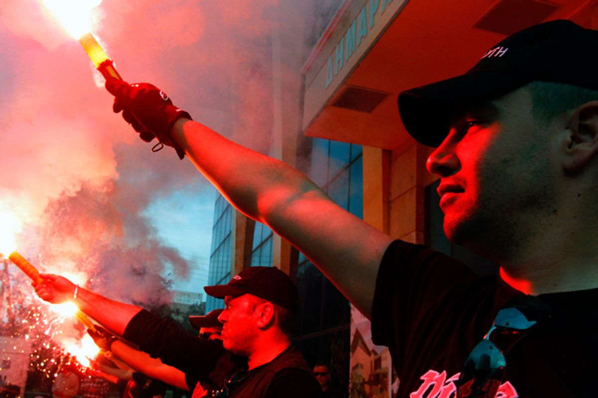 Members of the Greek extreme right Golden Dawn party hold an election rally.       (Reuters/Yannis Behrakis)