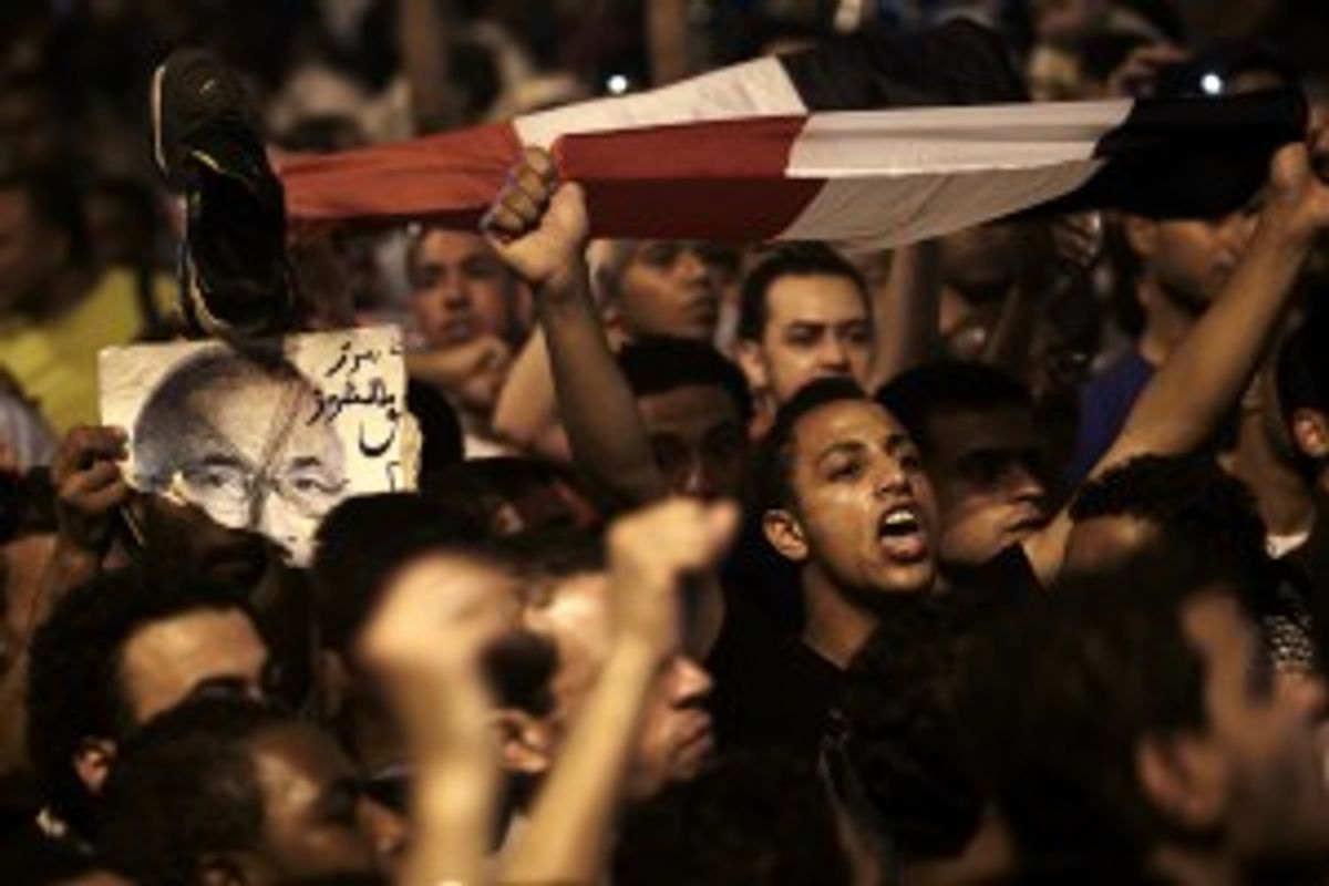  The revolutionary youth of Egypt return to Tahrir to protest the outcome of the Egyptian presidential election, Cairo, Egypt.            (AP Photo/Fredrik Persson)