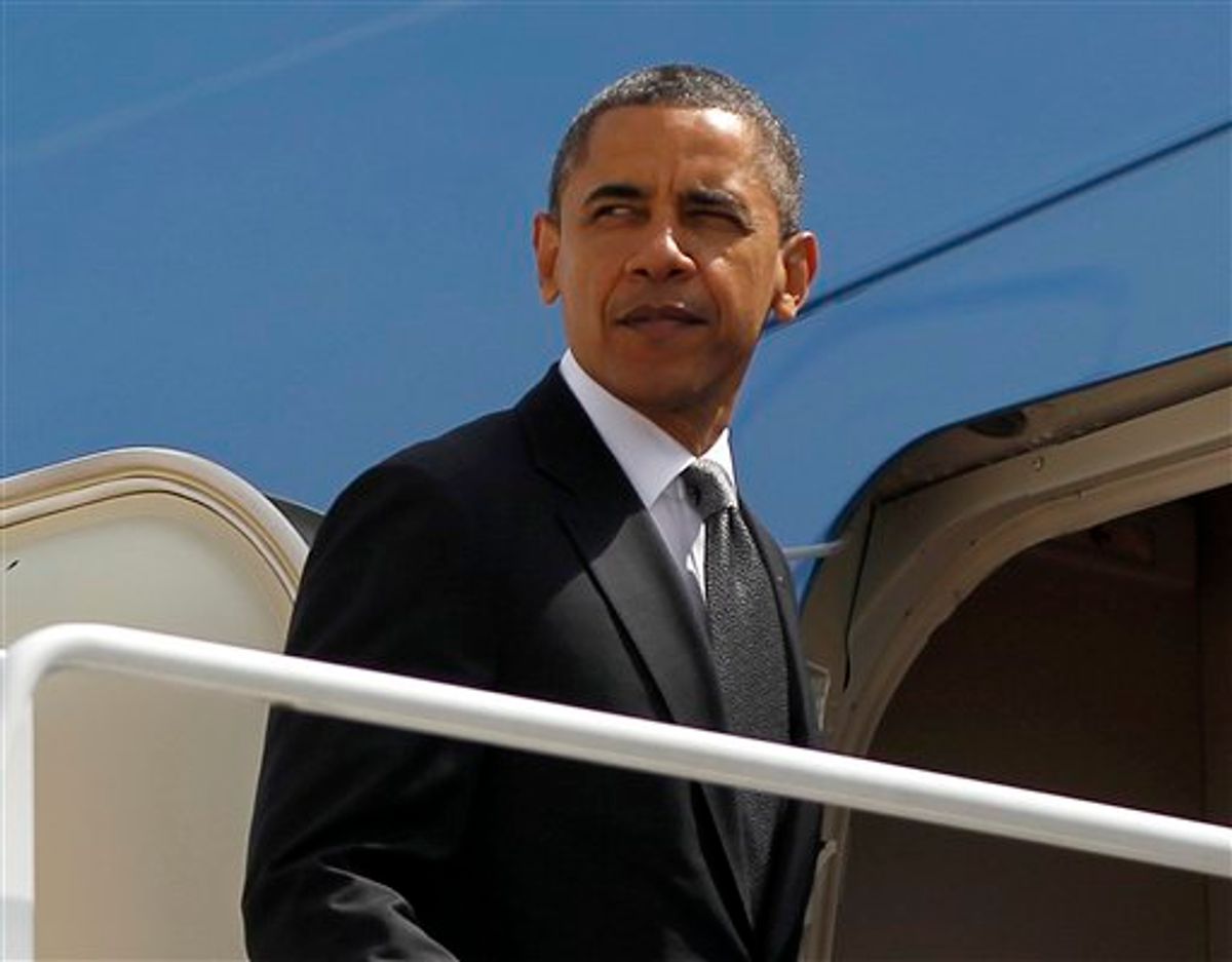President Barack Obama prepares to board Air Force One before his departure from Andrews Air Force Base, Tuesday, May, 8, 2012. (AP Photo/Pablo Martinez Monsivais)       (AP)