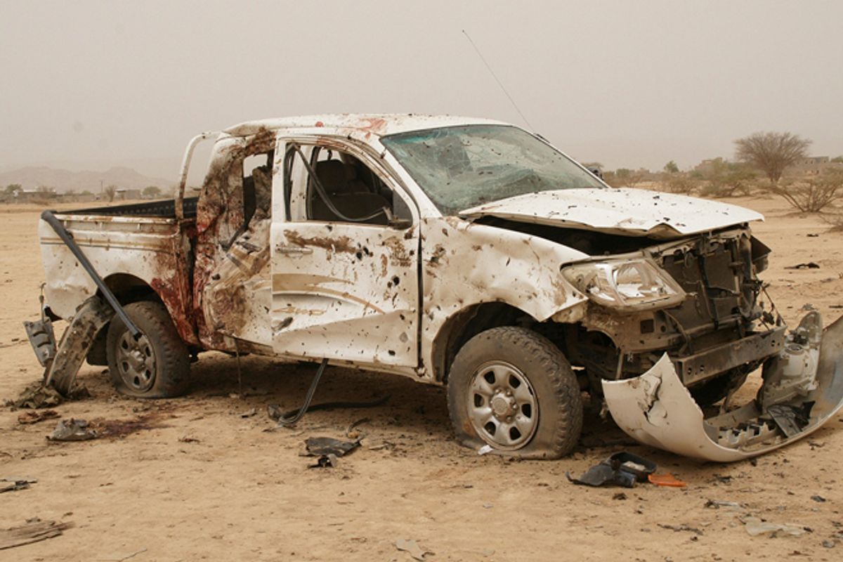 A destroyed vehicle allegedly belonging to al Qaeda-linked militants in Abyan, Yemen.         (Reuters)