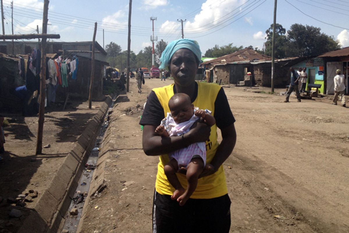 Maimouna, a Nairobi woman who says she was imprisoned in Pumwani hospital after being unable to pay for maternity care, outside her home.    