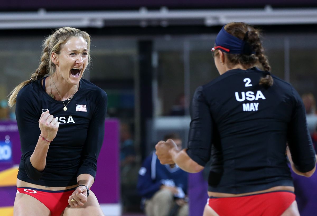 Walsh and May-Treanor celebrate during the Beach Volleyball match at the 2012 Summer Olympics, Saturday.   (AP/Petr David Josek)