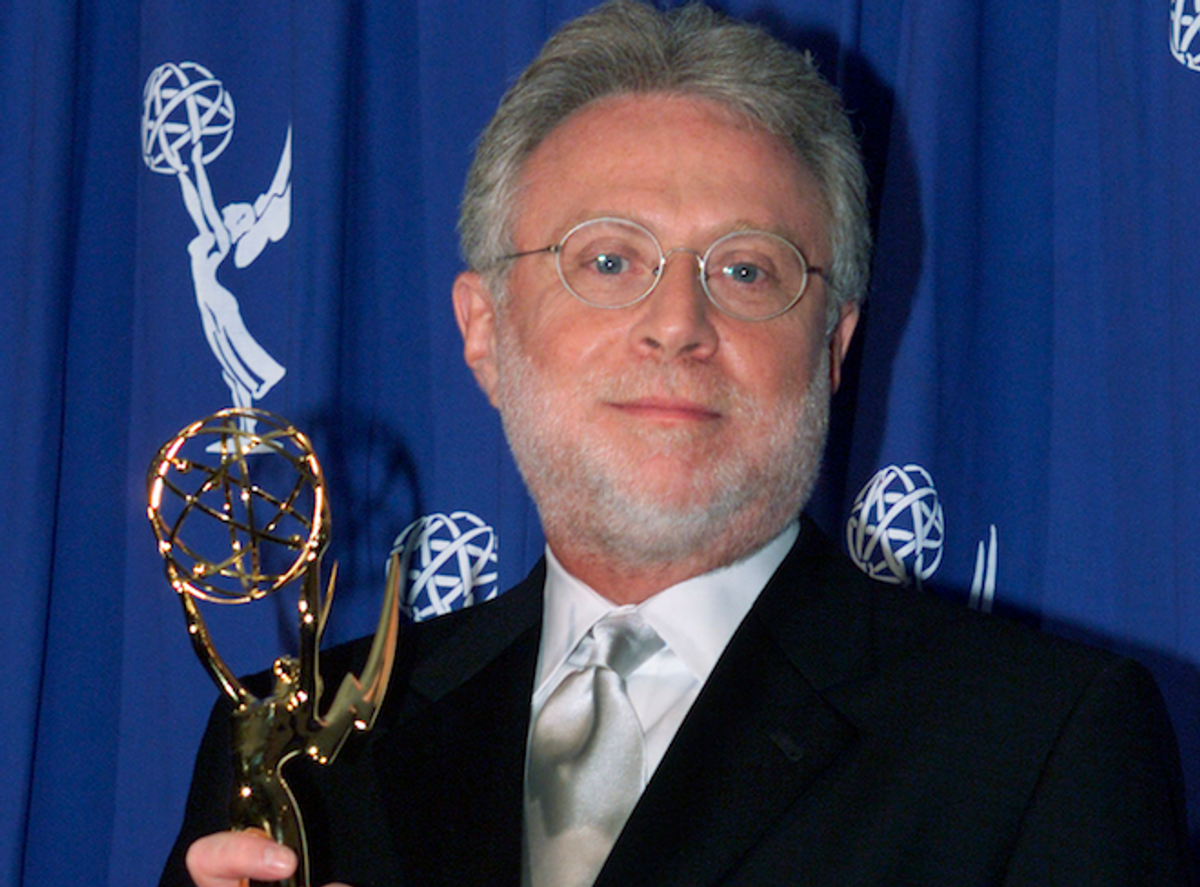 Television newsman Wolf Blitzer of CNN poses with the Governors Award presented to CNN at the Creative Arts Emmy Awards, September 8, 2001 in Pasadena.        (Reuters/Fred Prouser)