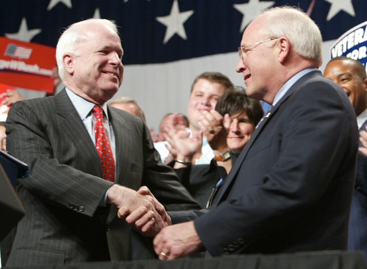 Sen. John McCain, R-Ariz., left, shakes hands with Vice President Dick Cheney after McCain introduced Cheney during a campaign stop, Friday, July 16, 2004, at the Lansing Center in Lansing, Mich.   (AP Photo/Al Goldis)