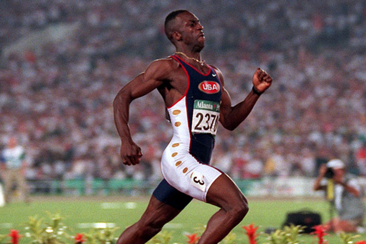 Michael Johnson at the 1996 Olympic Games in Atlanta.    (AP/Michael Probst)