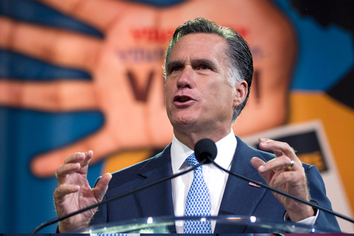 Romney gestures during a speech to the NAACP annual convention in Houston on Wednesday.    (AP/Evan VUcci)