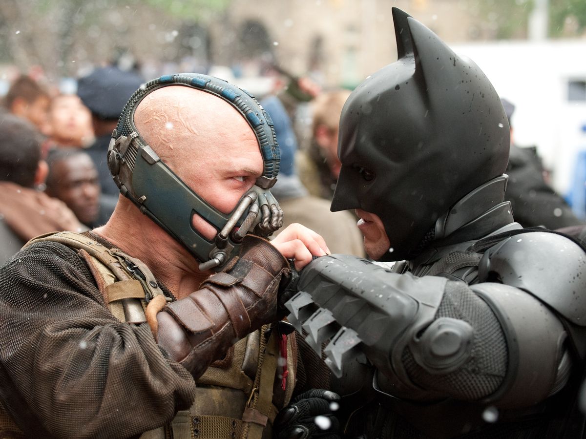 (L-r) TOM HARDY as Bane and CHRISTIAN BALE as Batman in Warner Bros. Picturesâ and Legendary Picturesâ action thriller âTHE DARK KNIGHT RISES,â a Warner Bros. Pictures release. TM and Â© DC Comics   (Ron Phillips)