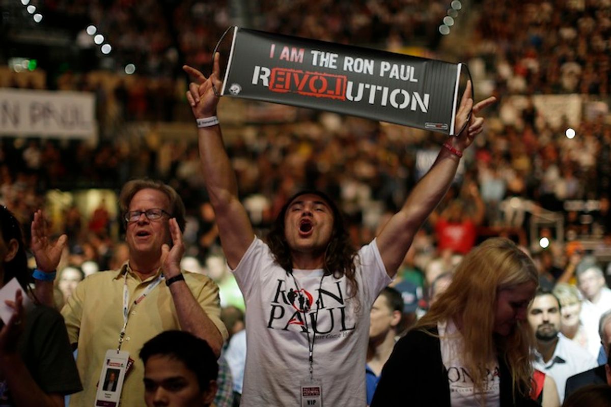 Supporters of Rep. Ron Paul, R-Texas, rally at the University of South Florida Sun Dome on the sidelines of the Republican National Convention in Tampa, Fla., on Sunday, Aug. 26, 2012. (AP Photo/Charles Dharapak)  (AP/Charles Dharapak)