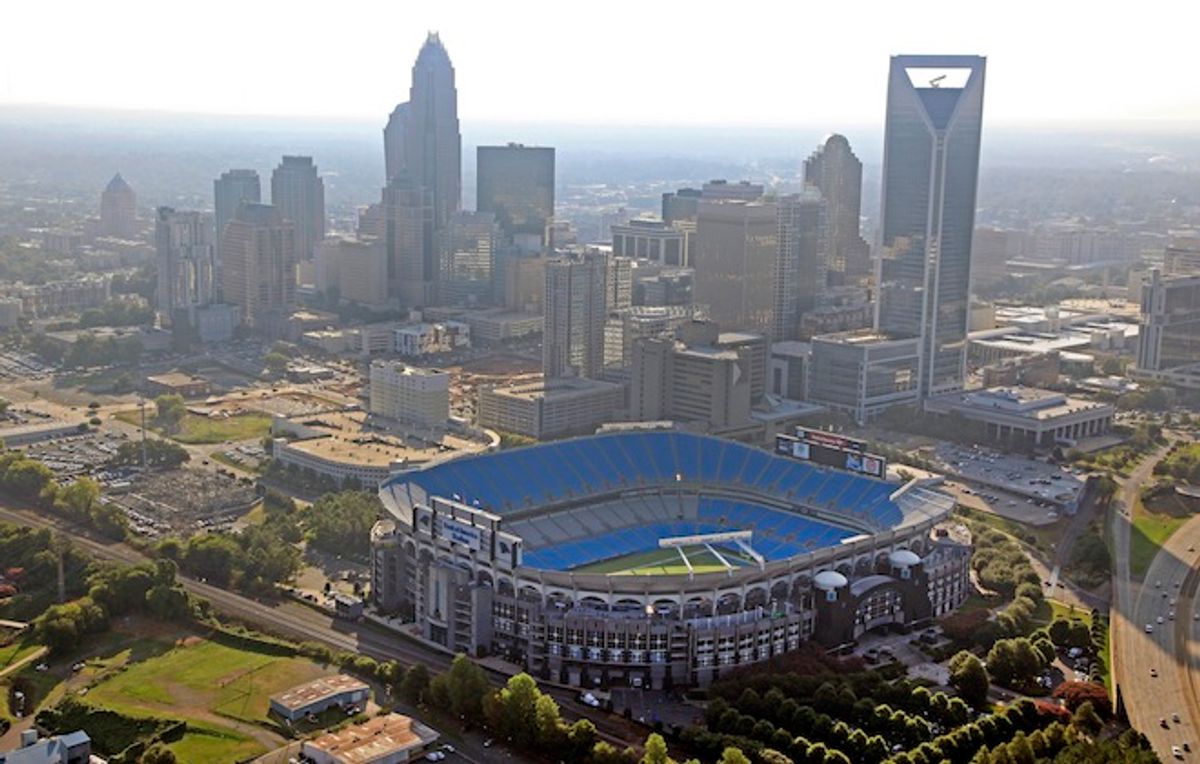 Bank of America Stadium is shown by the skyline of downtown Charlotte, N.C., Thursday, Aug. 16, 2012. The stadium is one of the sites of the Democratic National Convention. The convention starts on Sept. 3, 2012.            (AP/Chuck Burton)