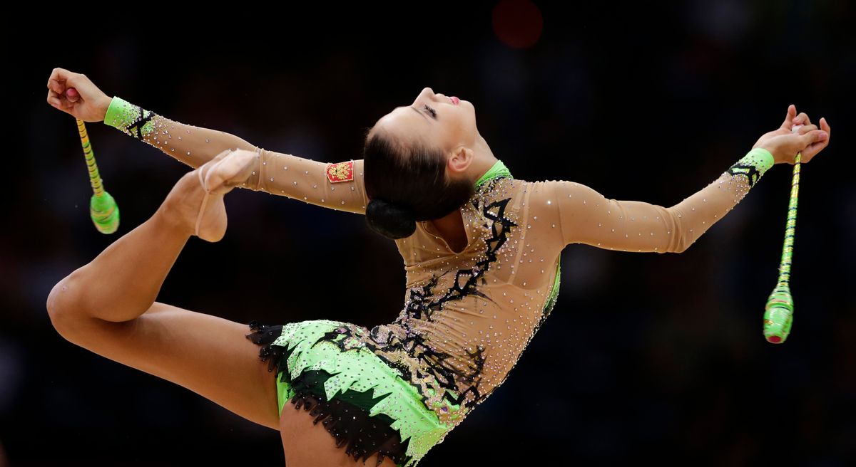 Russia's Daria Dmitrieva during the rhythmic gymnastics individual all-around qualifications at the 2012 Summer Olympics.     (AP/Gregory Bull)