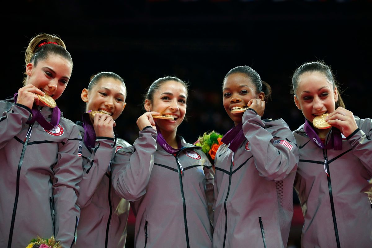 It was gold for the American women in the Artistic Gymnastics team final.     (AP/Matt Dunham)