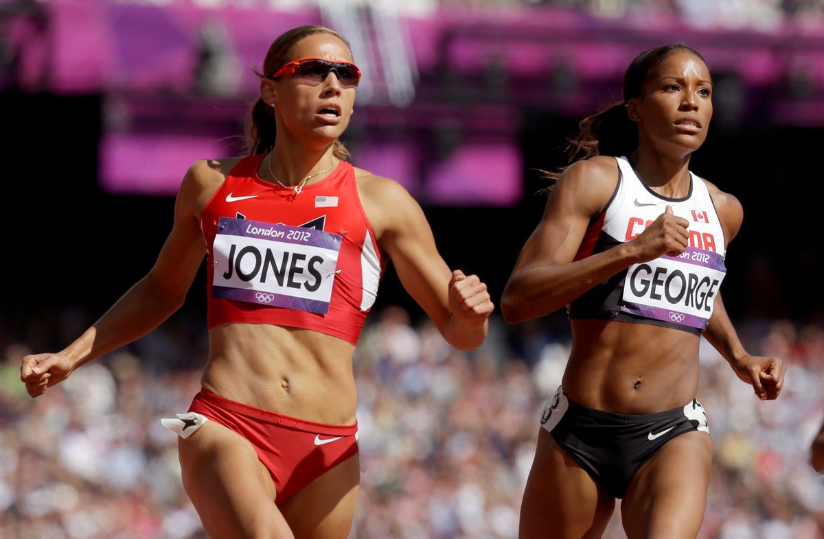United States' Lolo Jones, left,  Canada's Phylicia George during the athletics in the Olympic Stadium at the 2012 Summer Olympics, London, Monday, Aug. 6, 2012. (AP Photo/Anja Niedringhaus)    (AP/Anja Niedringhaus)