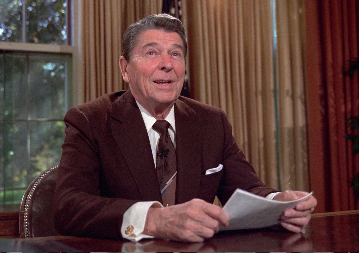 President Ronald Reagan works at his desk in the Oval Office of the White House as he prepares a speech on tax revision  in this May 24,1985 photo. It is reported that Reagan died on Saturday, June 5, 2004 at 93.  (AP Photo/Scott Stewart)   (AP)
