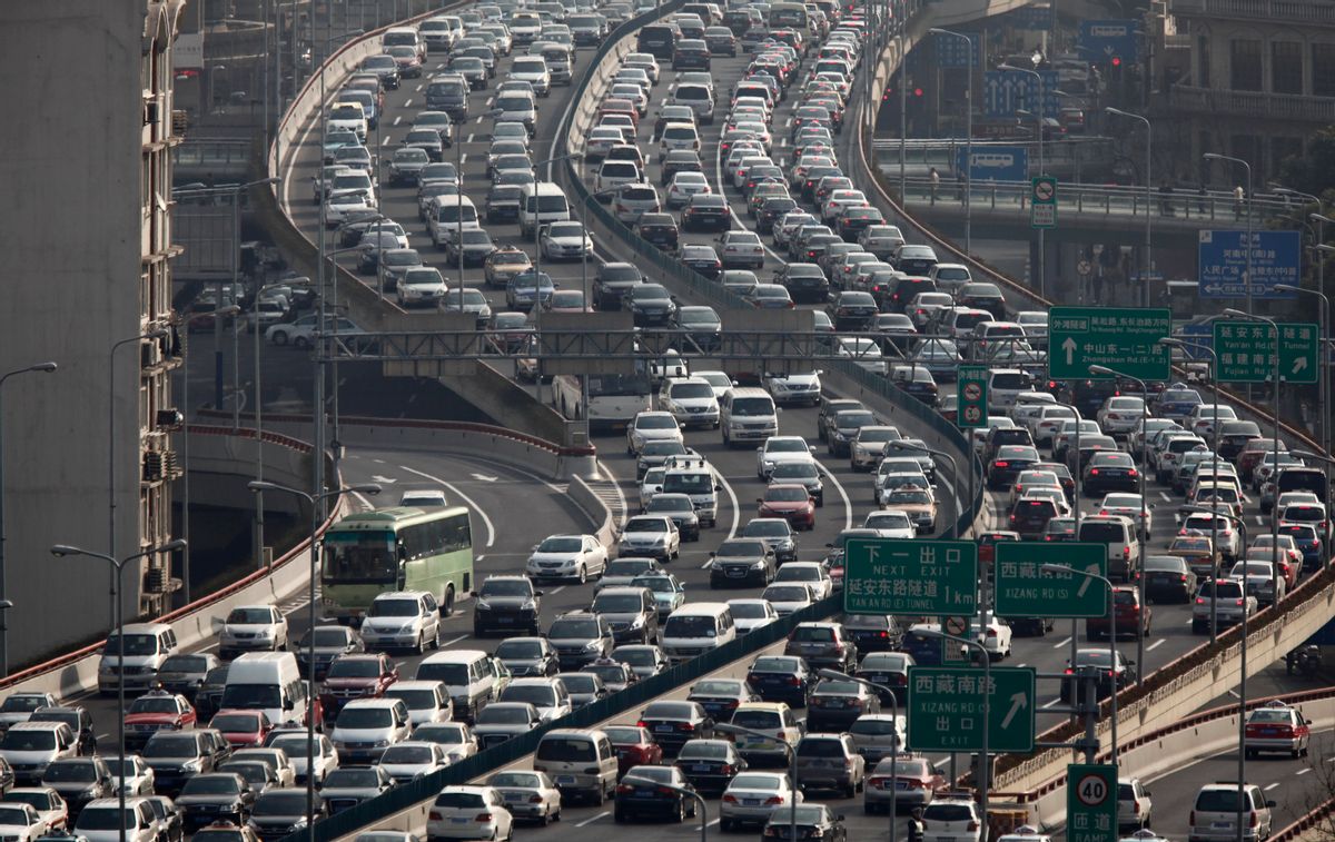 Heavy traffic on a highway during the morning rush hours in Shanghai   (Carlos Barria/Reuters)