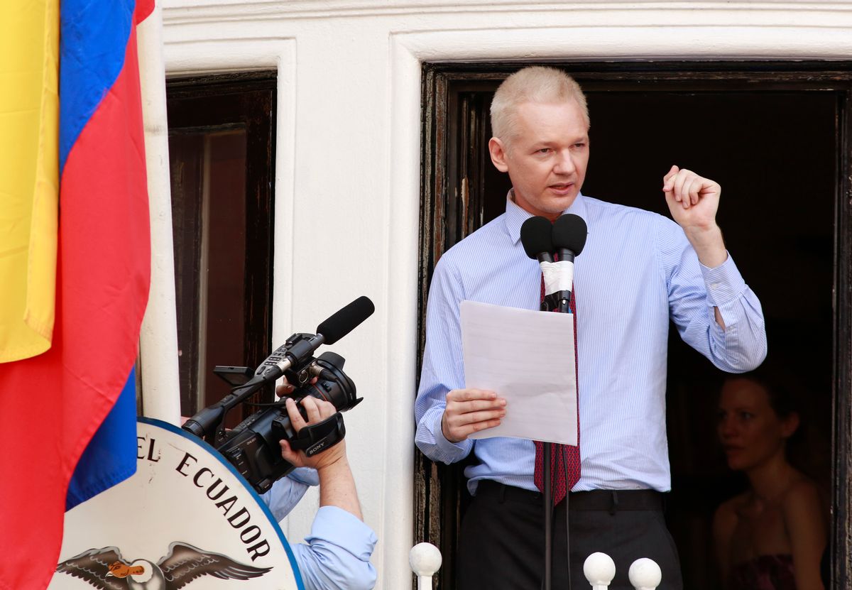 Assange used the balcony of Ecuador's London embassy on Sunday to berate the United States for threatening freedom of expression.       (Olivia Harris/Reuters)