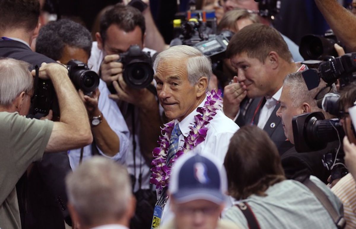 Former Republican presidential candidate, Representative Ron Paul (R-Tx), greets convention goers as he walks the floor before the start of the second session of the 2012 Republican National Convention in Tampa, Florida, August 28, 2012.       (Reuters/Jason Reed)
