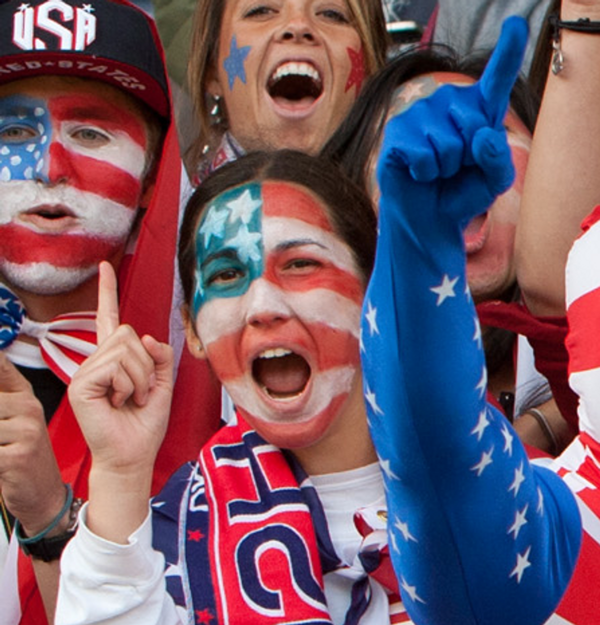 U.S. supporters cheer during the group G women's soccer match between the United States and Colombia.   (AP)