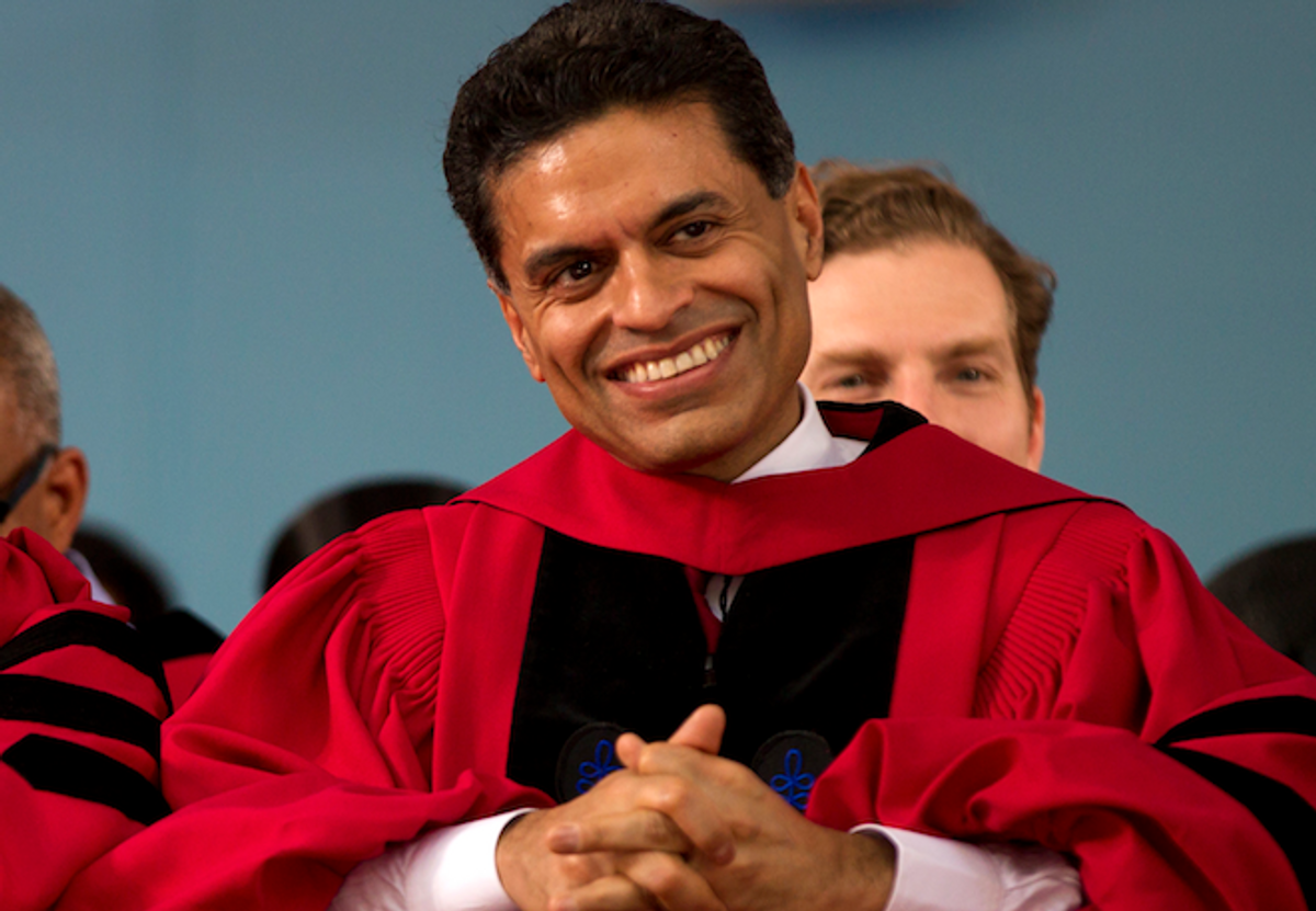  Journalist Fareed Zakaria is seated during Harvard University commencement exercises before being awarded an honorary Doctor of Laws from the University, in Cambridge, Mass., Thursday, May 24, 2012.
 (AP/Steven Senne)