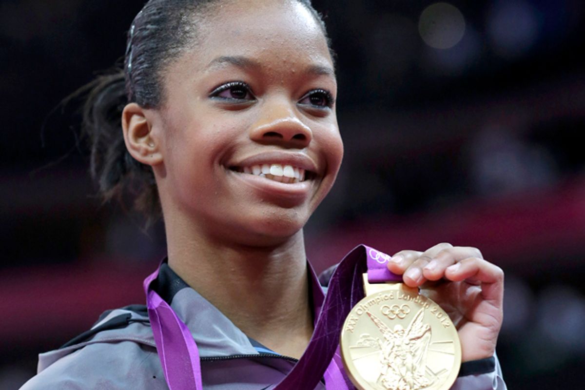 U.S. gymnast Gabrielle Douglas displays her gold medal   (AP/Julie Jacobson)