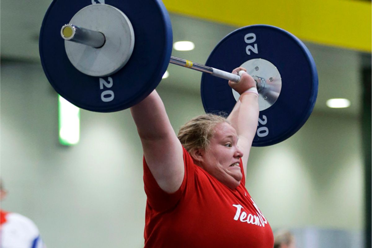 Weight-lifter Holley Mangold, of the United States, trains in preparation for the start of the 2012 Summer Olympics     (AP/Hassan Ammar)