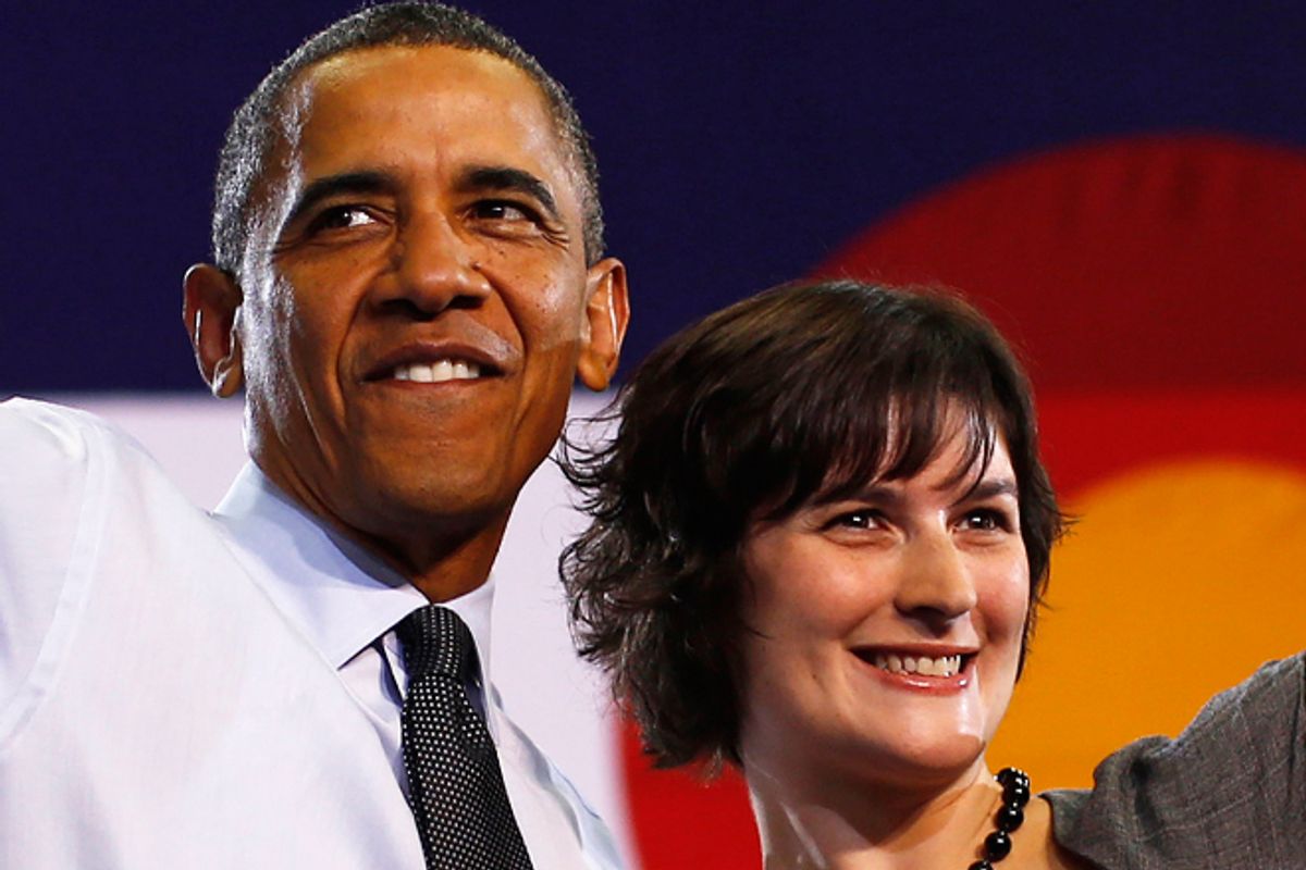 Barack Obama and Sandra Fluke during an election campaign rally in Denver on Wednesday.      (Reuters/Jason Reed)