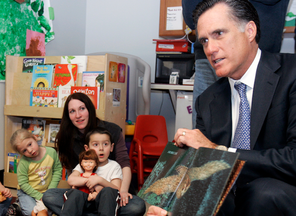 Republican presidential candidate and former Massachusetts Governor Mitt Romney (R) reads a book to children in a childcare program at the state's Easter Seals headquarters in Manchester, New Hampshire April 3, 2007.             (REUTERS/Brian Snyder)