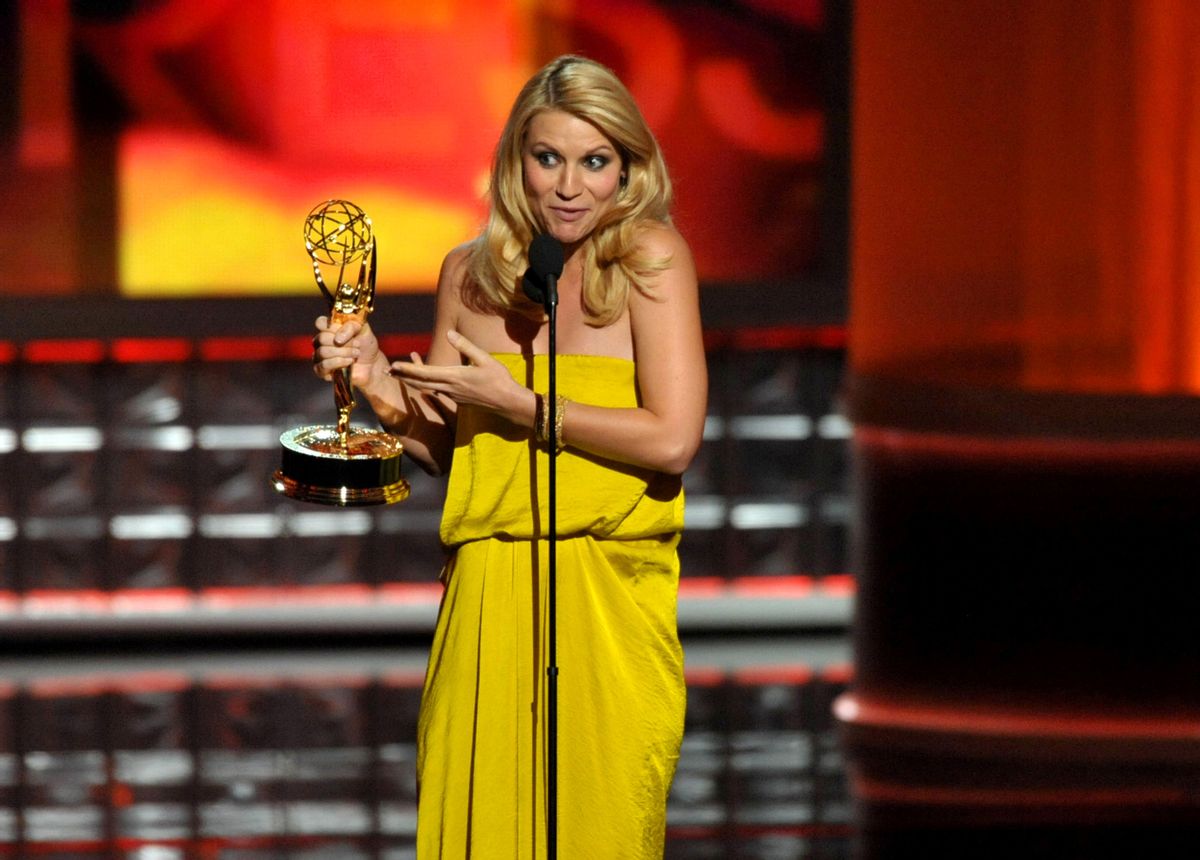 Claire Danes accepts the award for outstanding lead actress in a drama series for "Homeland"    (John Shearer/AP)