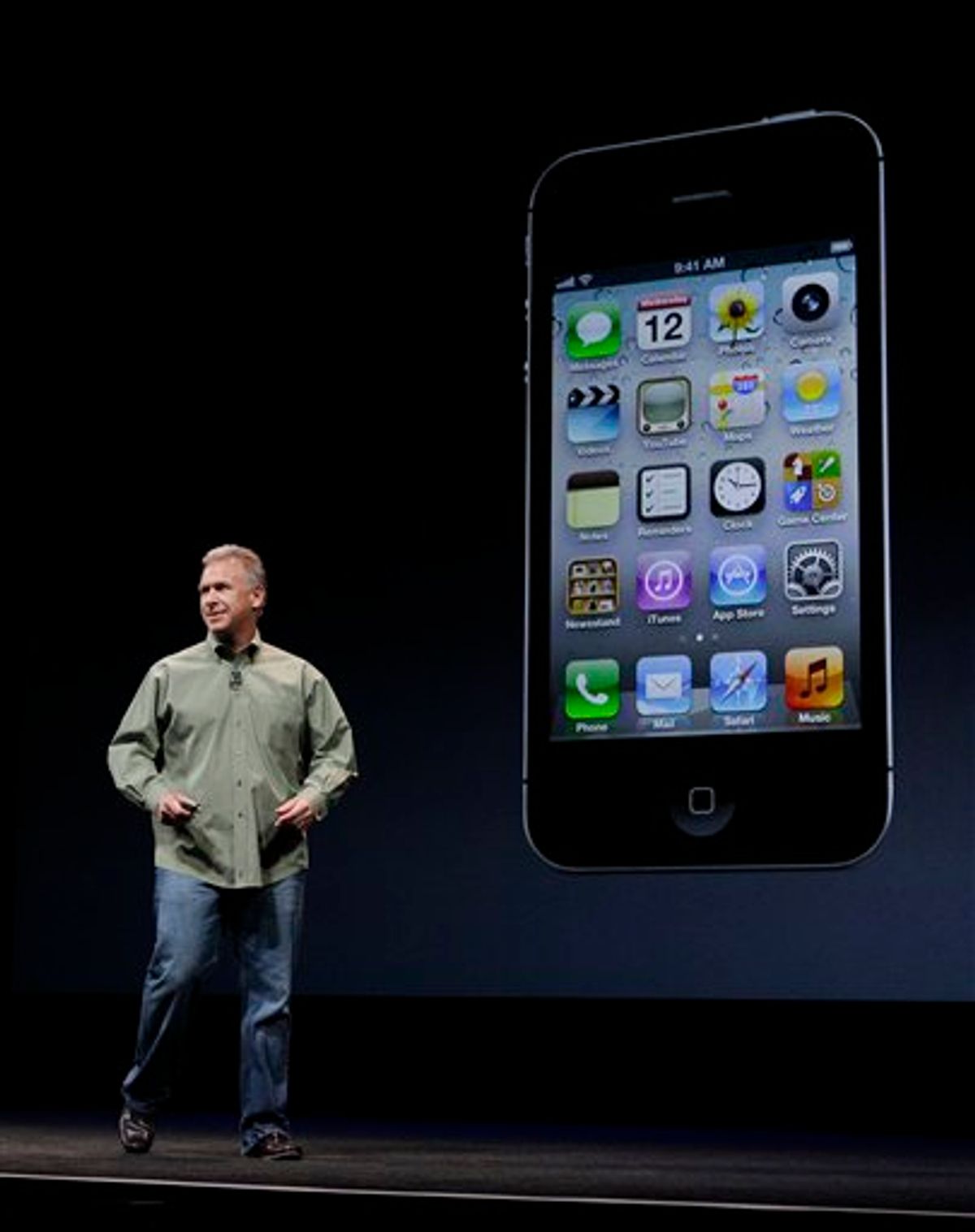 Phil Schiller, Apple's senior vice president of worldwide marketing, speaks on stage during an introduction of the new iPhone 5 at an Apple event in San Francisco, Wednesday Sept. 12, 2012. (AP Photo/Eric Risberg)      (Associated Press)
