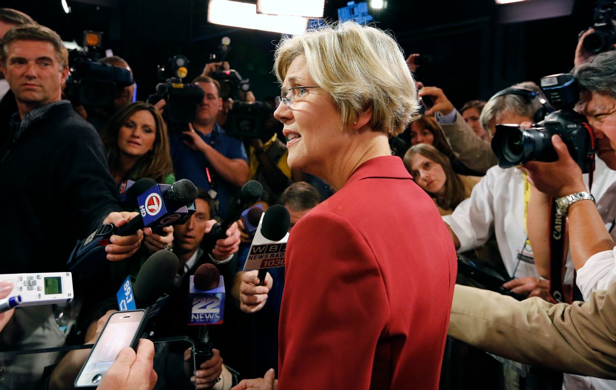 Elizabeth Warren talks with reporters following her debate with Sen. Scott Brown, R-Mass.   (AP /Michael Dwyer)