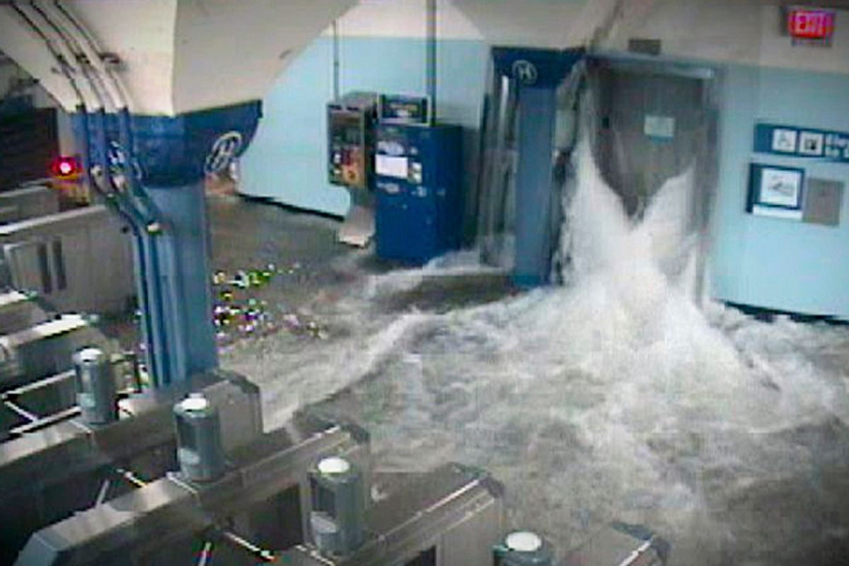 In this photo provided by the Port Authority of New York and New Jersey a surveillance camera captures the PATH station in Hoboken, N.J., as it is flooded shortly before 9:30 p.m. EDT on Monday, Oct. 29, 2012.      (AP)