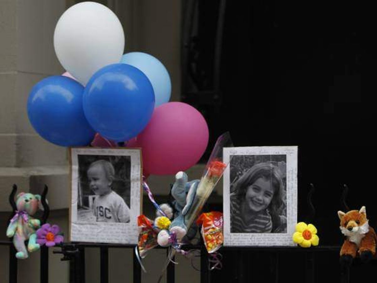  A memorial outside the childrens' apartment  (AP)