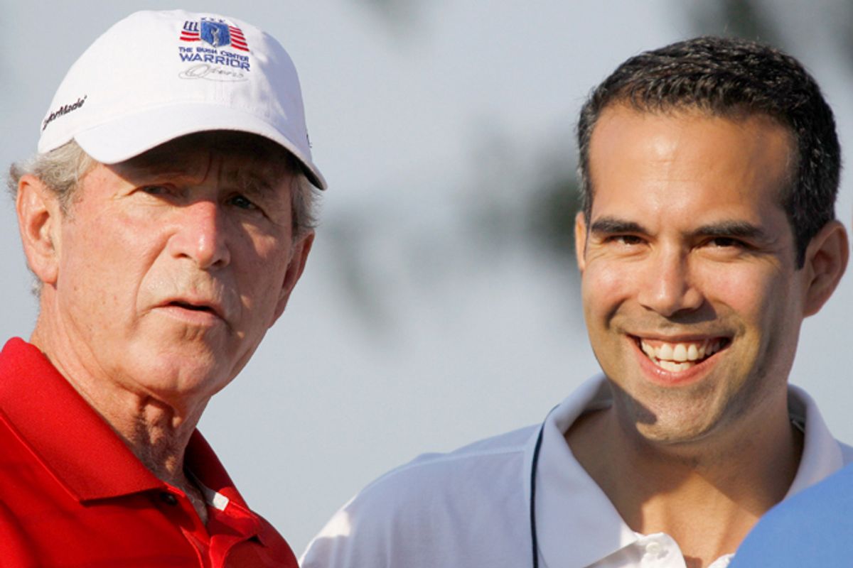 Former President George W. Bush, left, talks with talks with his nephew George P. Bush during the Bush Center Warrior Open in Irving, Texas,  Sept. 24, 2012.      (AP/Lm Otero)