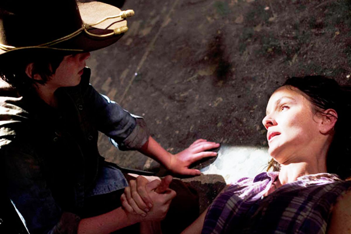 Chandler Riggs and Sarah Wayne Callies in "The Walking Dead"       