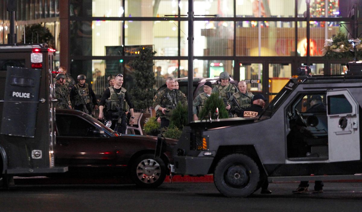 Police exit the Clackamas Town Center shopping mall in Portland, Oregon.  (Reuters)
