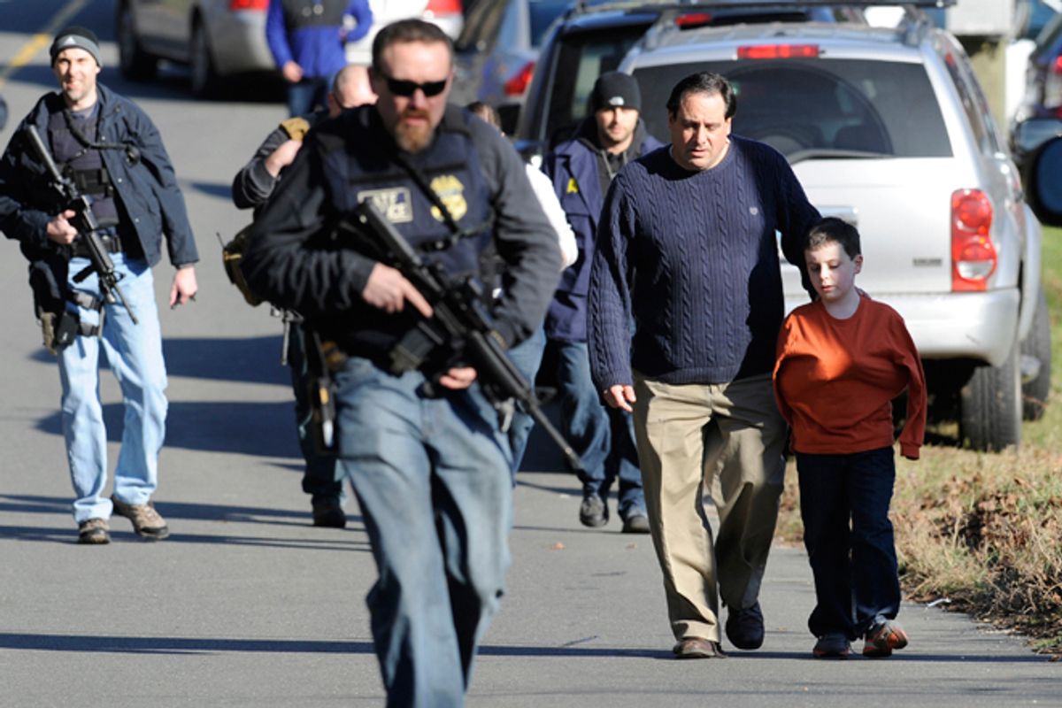 Parents leave after being reunited with their children following a shooting at the Sandy Hook Elementary School in Newtown, Conn., Friday.         (AP/Jessica Hill)