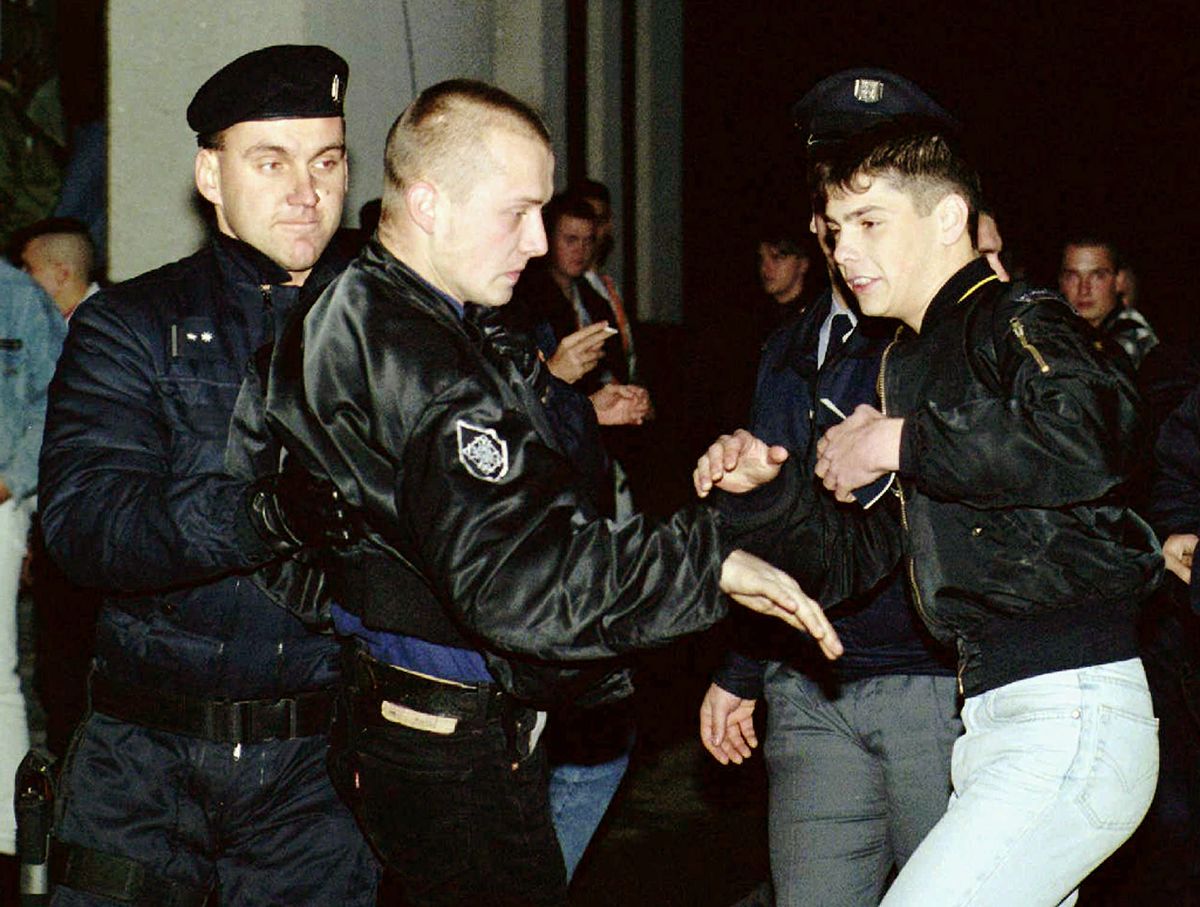Czech riot policemen clash with drunken skinheads in Kozolupy, some 100 kilometres southwest of Prague.      (AP/Jiri Bervida)