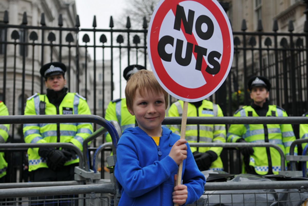  A child protest austerity measures in Britain   (1000 Words / Shutterstock)