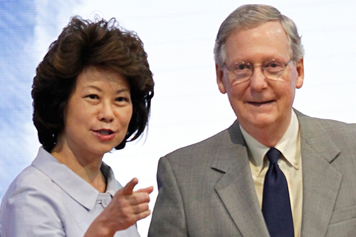 Former Labor Secretary Elaine Chao and her husband, Sen. Mitch McConnell, R-Ky.  (AP/J. Scott Applewhite)