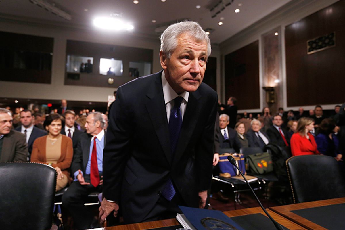 Former Sen. Chuck Hagel (R-NE) sits down before giving testimony to the Senate Armed Services Committee. Republicans have taken unprecedented action to block his secretary of defense nomination. <BR>Credit: Reuters/Kevin Lamarque          