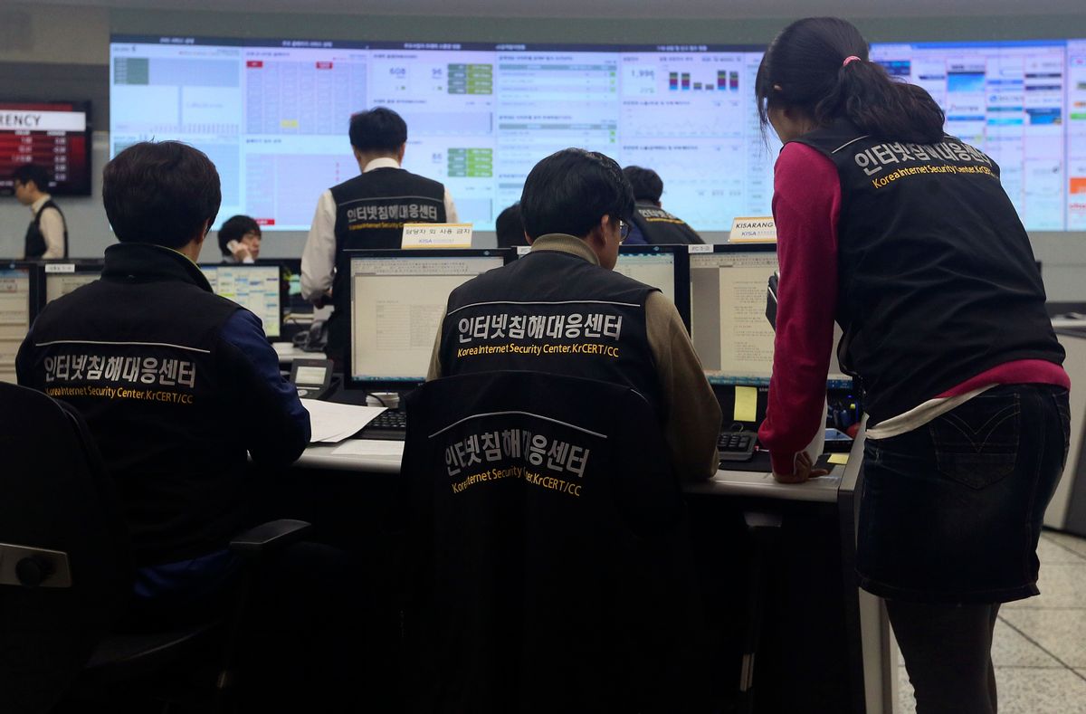 Employees of Korea Internet Security Center work after computer networks at two major South Korean banks and three top TV broadcasters war paralyzed at a monitoring room in Seoul, South Korea, Wednesday, March 20, 2013.                        (AP/Yonhap, Han Jong-chan)