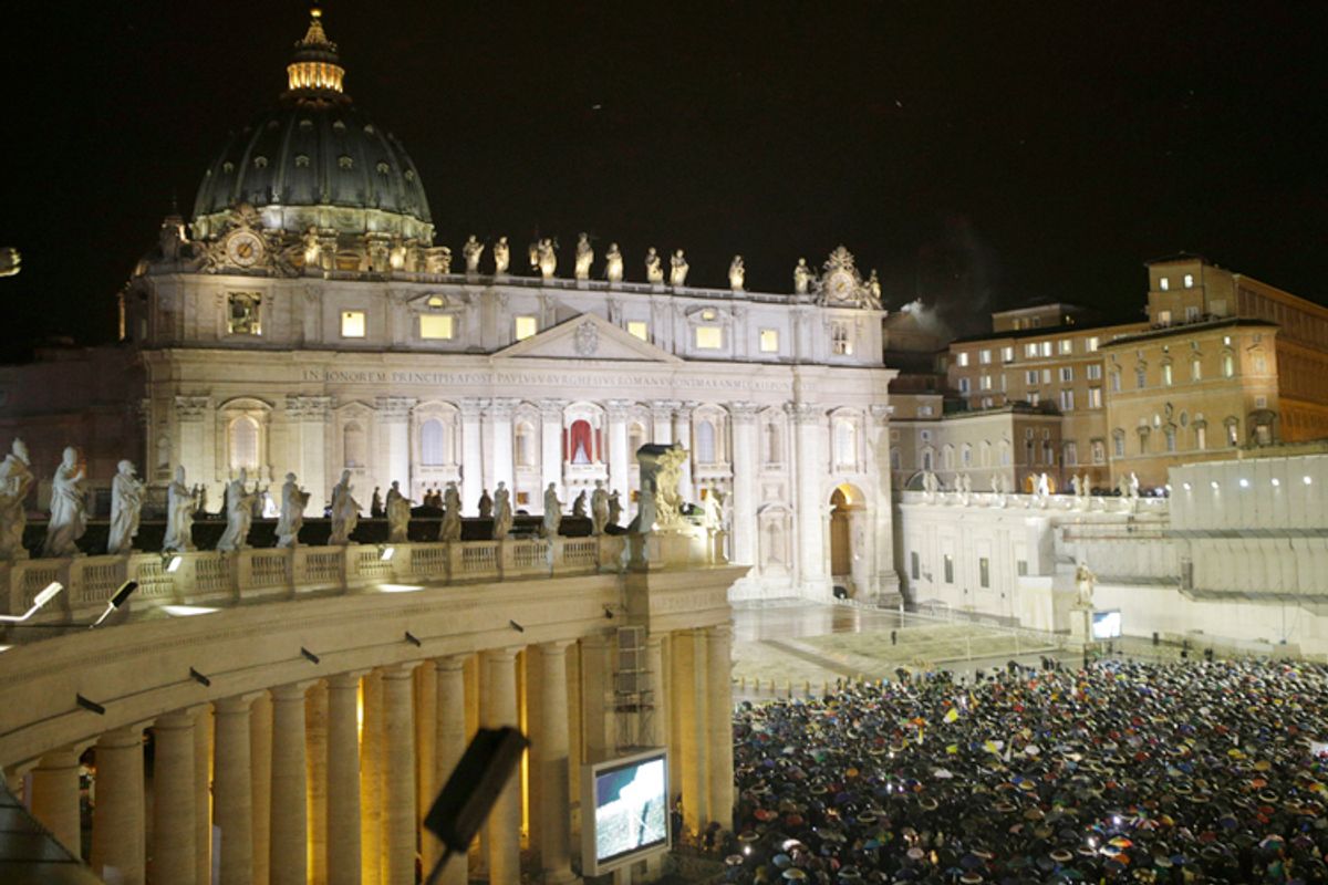 White smoke billows from the chimney on the Sistine Chapel indicating that a new pope has been elected in St. Peter's Square at the Vatican, Wednesday, March 13, 2013.  (AP/Andrew Medichini)