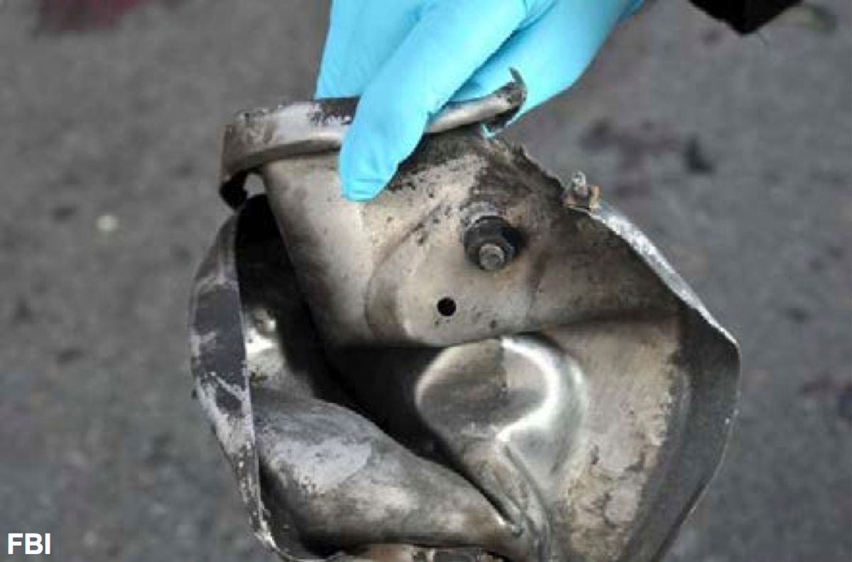 The remains of a pressure cooker that the FBI says was part of one of the bombs that exploded during the Boston Marathon.        (Associated Press)