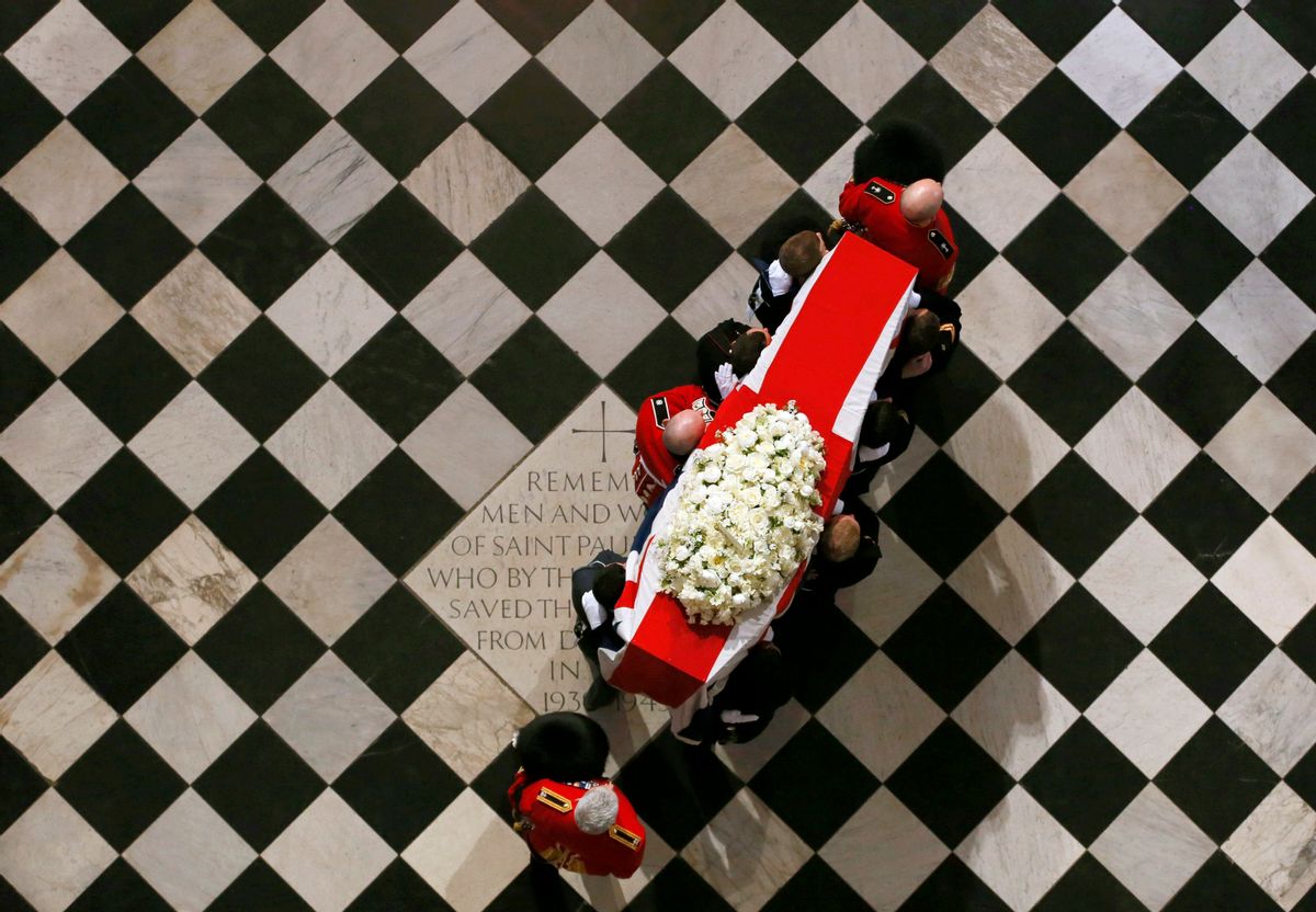 The coffin containing the body of former British Prime Minister Margaret Thatcher arrives for the ceremonial funeral at St Paul's Cathedral in London, Wednesday.  (AP/Stefan Wermuth)