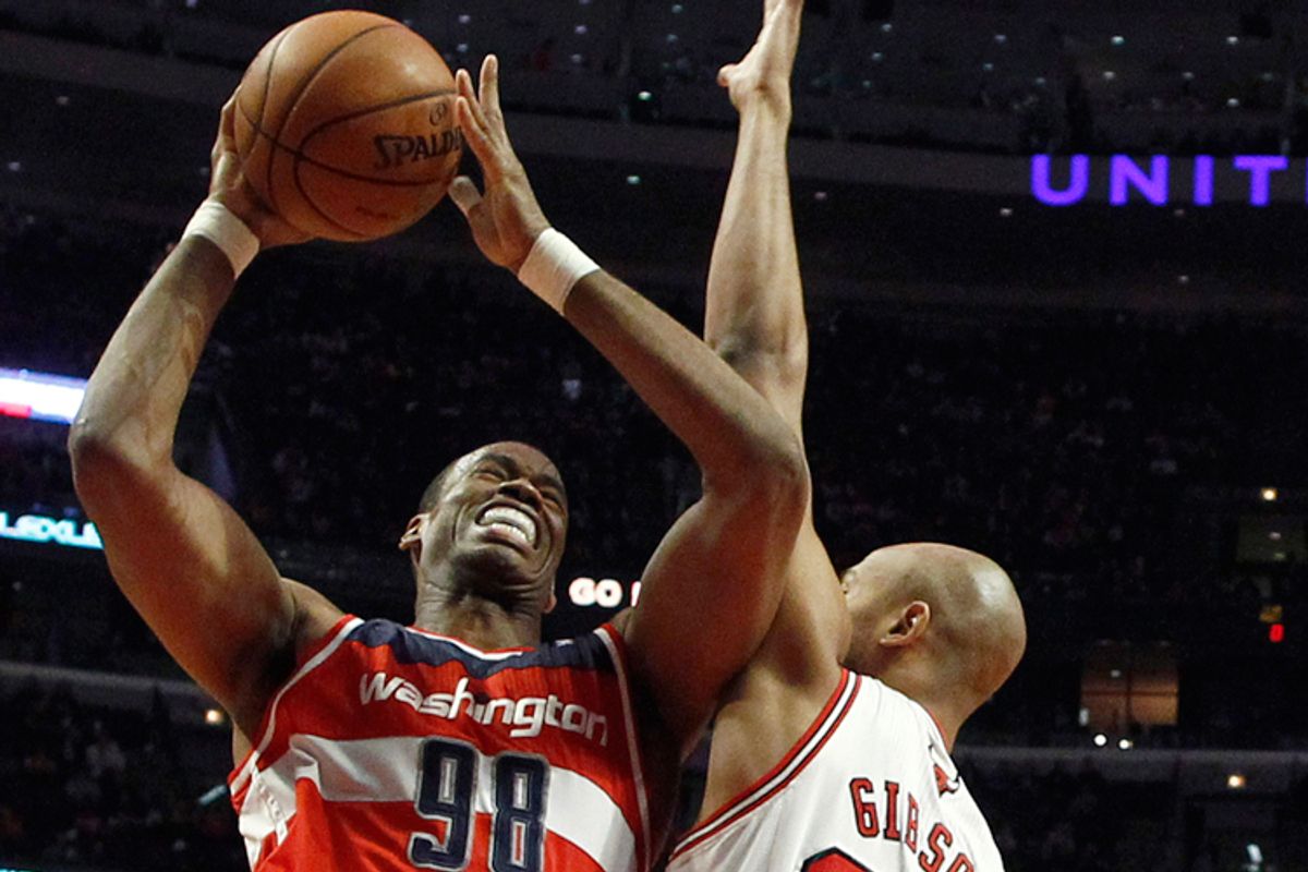 Jason Collins fights to the basket against Chicago Bulls' Taj Gibson, April 17, 2013.        (Reuters/Jim Young)