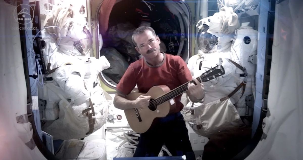 This image provided by NASA shows astronaut Chris Hadfield recording the first music video from space Sunday May 12, 2013. The song was his cover version of David Bowie's Space Oddity. Hadfield and astronaut Thomas Marshburn are scheduled to return to earth Monday May 13, 2013. (AP Photo/NASA, Chris Hadfield)   (Associated Press)