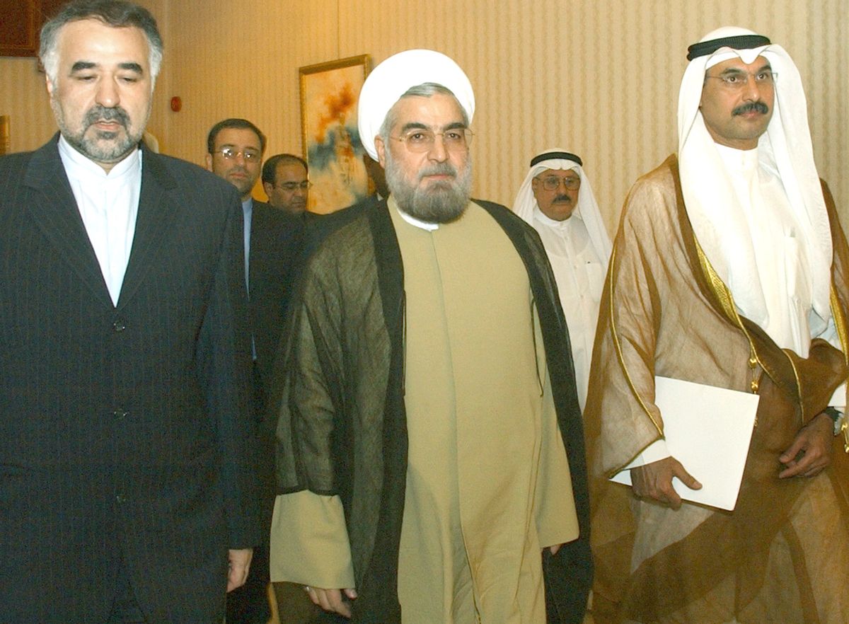 Secretary of Iran's National Security Supreme Council Hassan Rouhani, center  (AP/Gustavo Ferrari)